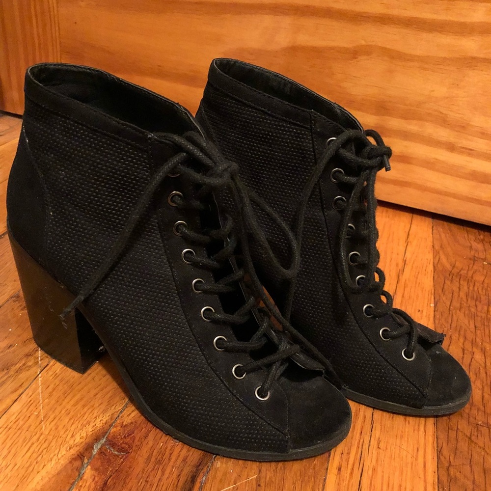 Black perforated faux suede block heels